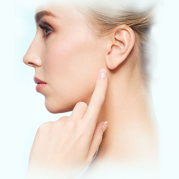 woman turned to the side pointing to her ear lobe